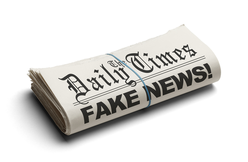 Fake,News,In,The,Daily,Times,Isolated,On,White,Background.