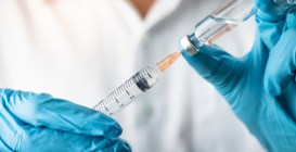 Doctor,,Nurse,,Scientist,,Researcher,Hand,In,Blue,Gloves,Holding,Flu,