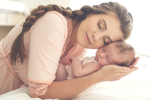 Portrait,Of,A,Beautiful,Mother,,With,Her,Nursing,Baby.,High