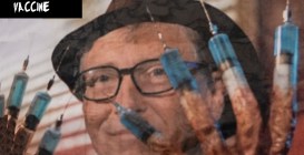 Woman,Holds,Bill,Gates,Pictures,During,An,Anti,Lockdown,Protest