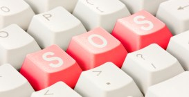 White,Computer,Keyboard,With,Red,Keys,Arranged,In,The,Word