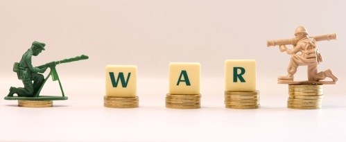 Inflation,Due,To,War,Concept.,Stack,Of,Coins,With,Word