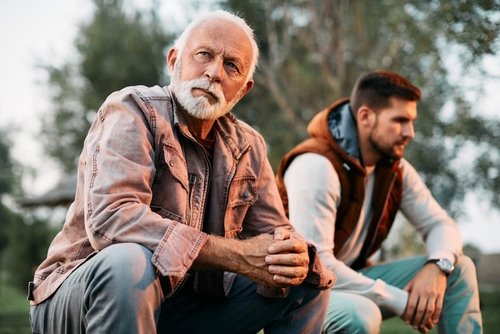 Pensive,Senior,Father,Ignoring,His,Adult,Son,After,An,Argument