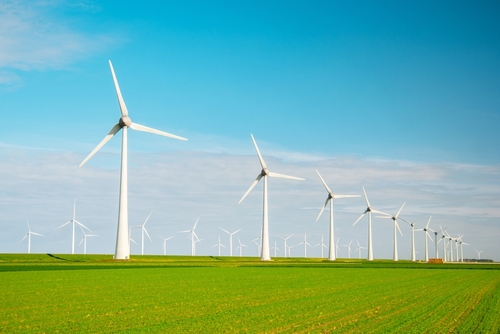 Offshore,Windmill,Park,With,Clouds,And,A,Blue,Sky,,Windmill