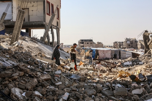 Displaced,Palestinians,Among,The,Rubble,Of,Destroyed,Homes,During,The